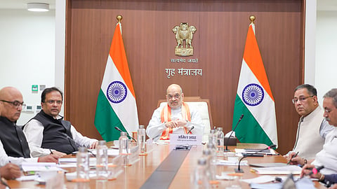 Home Minister Amit Shah reviews cybercrime helpline in New Delhi on Wednesday.