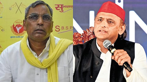 (L-R) SBSP chief Om Prakash Rajbhar and SP chief Akhilesh Yadav.