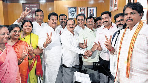 Senior BJP leaders congratulate the party’s winning candidates in Vidhana Soudha on Thursday