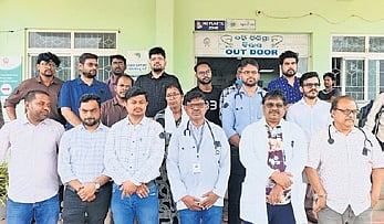 Doctors stage silent protest at the DHH in Malkangiri on Thursday