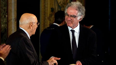 Then-Italian President Giorgio Napolitano, left, awards Italian professor Carlo Ginzburg with the “Balzan” prize, in Rome’s Quirinale presidential palace, Friday, Nov. 19, 2010.