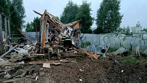 This photo released by Moscow Region Governor Andrei Vorobyev's official telegram channel shows the damage in a country side after a Ukrainian drone attack outside Moscow on Thursday, June 18, 2026
