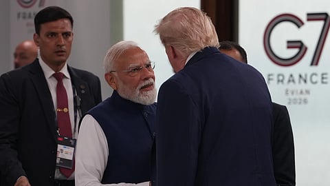 India's Prime Minister Narendra Modi shakes hands with US President Donald Trump before the plenary session at the G7 summit, Tuesday, June 16, 2026, in Evian-Les-Bains, France.