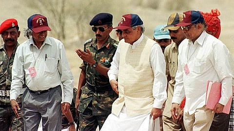 Prime Minister Atal Bihari Vajpayee accompanied by Defence Minister George Fernandes and Dr A P J Abdul Kalam at the Pokhran II tests site