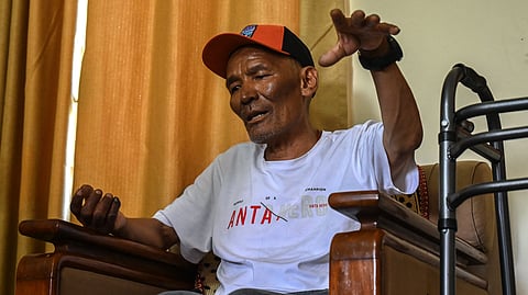 Everest survivor Dawa Sherpa speaks during an interview with AFP in Kathmandu on June 18, 2026. Dawa, a Nepali mountaineer who spent six days dragging himself off Mount Everest after being abandoned, has been moved out of intensive care as he slowly recovers, his family said on June 9.