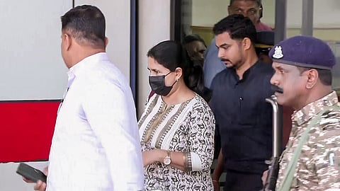 Enforcement Directorate officials, along with T Veena, daughter of ex-Kerala Chief Minister Pinarayi Vijayan, visit the HDFC Bank to check her locker as part of the ongoing probe in the Cochin Minerals and Rutile Limited (CMRL) and Exalogic Solutions case, in Thiruvananthapuram on Friday, June 19, 2026.
