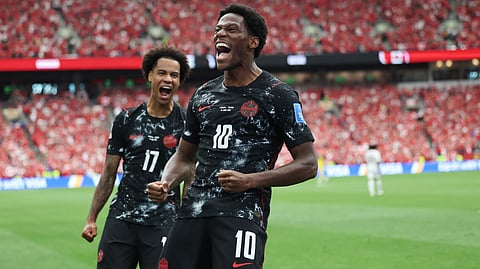 Canada's Jonathan David (10) celebrates after scoring their second goal during the World Cup Group B soccer match between Canada and Qatar in Vancouver, British Columbia, Thursday, June 18, 2026.