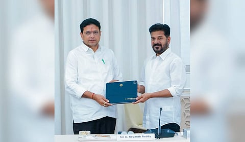 IT Minister D Sridhar Babu presents a tablet to Chief Minister A Revanth Reddy during a special Cabinet meeting on Thursday.