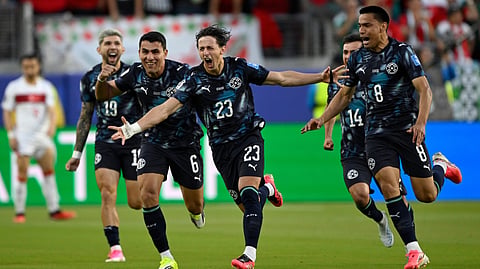 Paraguay's Matias Galarza (23) celebrates with his teammates after scoring their opening goal during the World Cup Group D soccer match between Turkey and Paraguay in Santa Clara, Calif., near San Francisco, Friday, June 19, 2026.