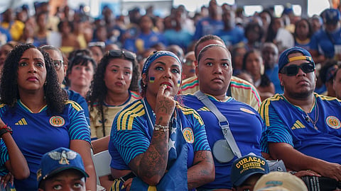 Curacao football fans watch their team's World Cup match against Germany, during a viewing party in Willemstad, Curacao, Sunday, June 14, 2026.