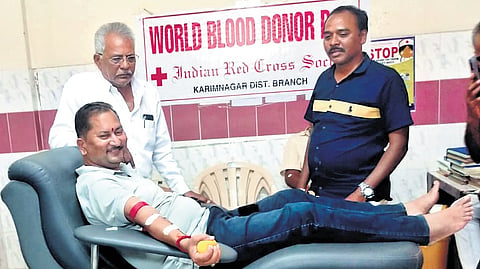 Red Cross Society district secretary V Radhakrishna Reddy donates blood