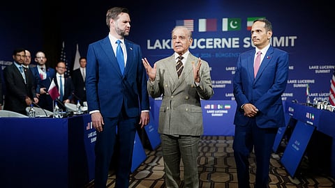 Pakistan's Prime Minister Shehbaz Sharif (C) speaks next to US Vice President JD Vance (L) and Qatar's Prime Minister and Minister for Foreign Affairs Sheikh Mohammed bin Abdulrahman bin Jassim Al-Thani during a quadrilateral meeting between the United States, Iran, Pakistan and Qatar at the Burgenstock luxury hotel complex overlooking Lake Lucerne, Switzerland, on June 21, 2026, as part of high-level talks aimed at advancing a deal to end the Middle East conflict.
