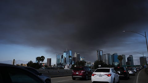 The sky is filled with smoke from a warehouse fire in Los Angeles on Wednesday, June 17, 2026