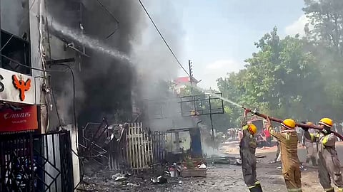 Firefighting operations are underway as a fire breaks out at a three-storey building in Aliganj, in Lucknow, Monday, June 22, 2026.