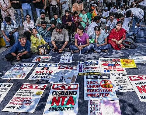 Cockroach Janta Party (CJP) supporters on the second day of a protest over alleged examination irregularities, repeated paper leaks and demands for accountability from the government, in New Delhi, Sunday, June 21, 2026.