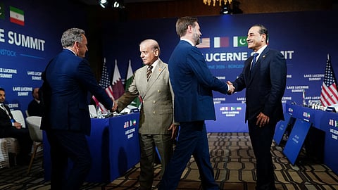 US Vice President JD Vance (2ndR), US President's special envoy Steve Witkoff (L), Pakistan's Prime Minister Shehbaz Sharif (2ndL) and Pakistan's Chief of Army Staff Field Marshal Asim Munir shake hands ahead of a quadrilateral meeting between the United States, Iran, Pakistan and Qatar.