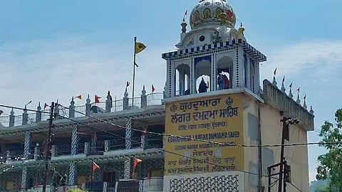 Nihang Sikhs continue to remain stationed on the roof of the Gurdwara as they demand the release of four members of the Sikh sect who were arrested following a clash in Chamolia, in Nagrasu on Monday, June 22, 2026.