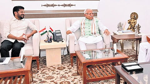 Chief Minister A Revanth Reddy meets Union Housing and Urban Affairs Minister Manohar Lal Khattar in New Delhi on Tuesday.