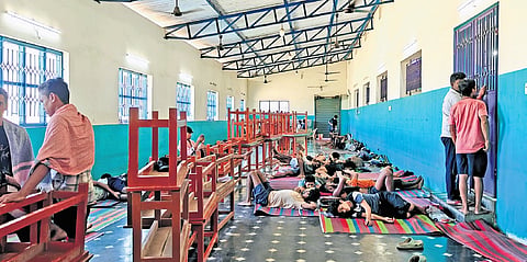 Workers shifted from the seafood unit resting at the private hall.