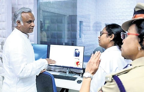 Home Minister Priyank Kharge interacts with officials during a visit to Forensic Science Laboratory at Madiwala in Bengaluru on Tuesday.