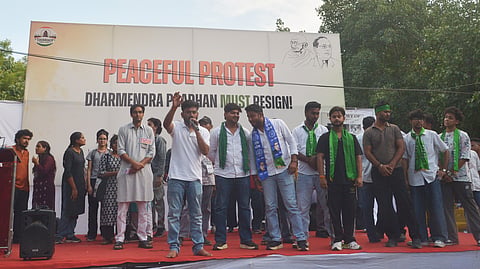 Cockroach Janta Party (CJP) founder Abhijeet Dipke, front centre, with supporters on the third day of a protest over alleged examination irregularities, repeated paper leaks and demands for accountability from the government, in New Delhi, Monday, June 22, 2026.