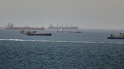 Tankers and cargo vessels are seen in the Gulf of Oman, along shipping routes linking the Strait of Hormuz and the Arabian Sea, Tuesday, June 16, 2026.