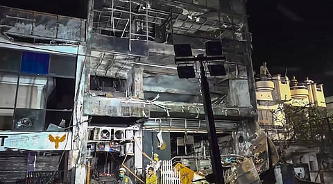 Charred remains of the site of a fire at a coaching centre, in Lucknow, Monday, June 22, 2026.