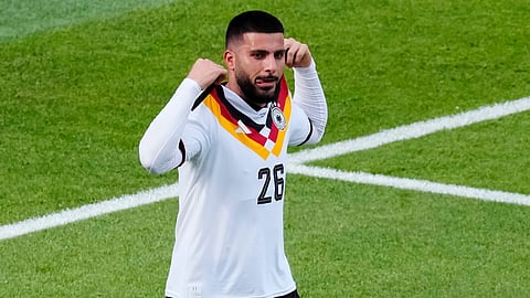 Germany's Deniz Undav celebrates after scoring their second goal during the World Cup Group E match against Ivory Coast