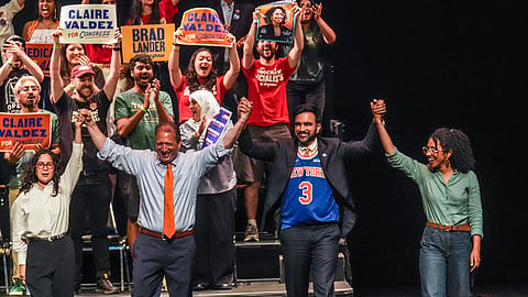 Democratic congressional candidates, Claire Valdez, Brad Lander, and Darializa Avila Chevalier gesture on stage with Mayor Zohran Mamdani during a Get Out The Vote rally ahead of New York's primary election, Thursday, June 18, 2026, in the Brooklyn borough of New York.