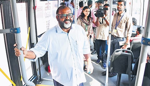 Transport Minister C P John, during a trial run of the DMRC hydrogen bus service in New Delhi.