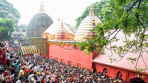 Devotees throng to offer prayers at the Maa Kamakhya Temple during the Ambubachi Mela, celebrating the annual menstruation cycle of Goddess Kamakhya, in Guwahati, Friday, June 26, 2026.