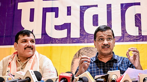 Aam Aadmi Party (AAP) national convenor Arvind Kejriwal addresses the media as AAP Rajya Sabha MP Sanjay Singh, left, looks on, in Ayodhya, Friday, June 26, 2026.