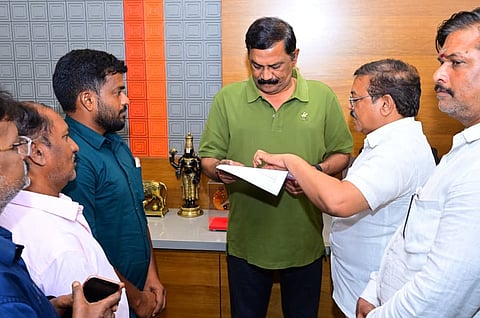Adivivaram residents submit a representation to Bheemunipatnam MLA Ganta Srinivasa Rao seeking pending compensation, TDR release, and rehabilitation support for families affected by the BRTS road widening in Visakhapatnam.