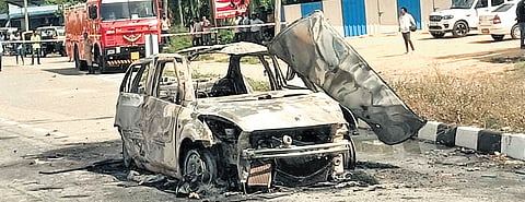 The car blown up by Nagendra on NH-48 near Tumakuru