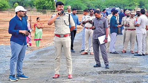 Markapuram district SP Harshavardhan Raju, along with the SSG officials, inspecting the security arrangements for CM’s visit to KS Palle.