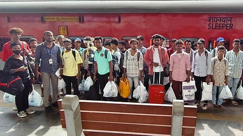 The migrant workers before boarding the train for Odisha.