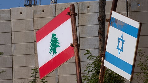 Israeli and Lebanese flags hang in a memorial site on the border with Lebanon in northern Israel, Saturday, June 27, 2026, after Israel and Lebanon sign a framework agreement.