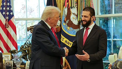 US President Donald Trump, left, shakes hands with Syria's President Ahmad al-Sharaa at the White House in Washington, Monday, Nov. 10, 2025.