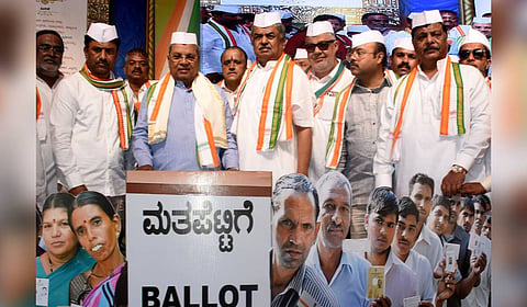 Former CM Siddaramaiah, KPCC Chief BK Hariprasad, Minister Yathindra Siddaramaiah and MLAs during a convention against SIR in Mysuru on Sunday.