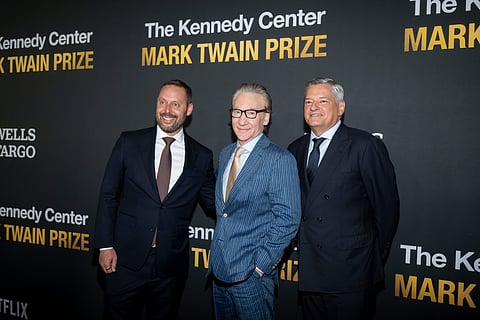 From left, Michael Kives, Comedian and political satirist Bill Maher, and Ted Sarandos pose on the red carpet for the 27th Annual Mark Twain Prize for American Humor Celebrating Bill Maher, Sunday, June 29, 2026, in Washington.