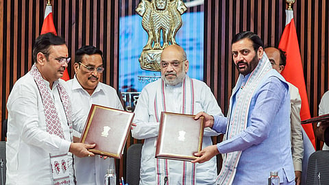 Union Minister Amit Shah witnesses the exchange of MoUs between Rajasthan Chief Minister Bhajanlal Sharma and Haryana Chief Minister Nayab Saini for the Haryana-Rajasthan Yamuna Water Project, in New Delhi on Monday. Union Jal Shakti Minister CR Patil also present.