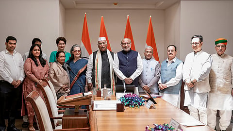 Vice President and Rajya Sabha Chairman CP Radhakrishnan with Congress MP Mallikarjun Kharge after administering oath as a member of the Rajya Sabha after his re-election.