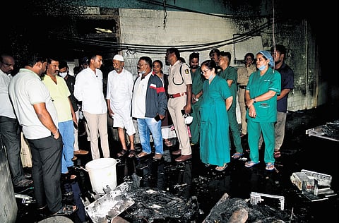Davangere MP Dr Prabha Mallikarjun inspects the damage at Chigateri District Government Hospital on Tuesday.