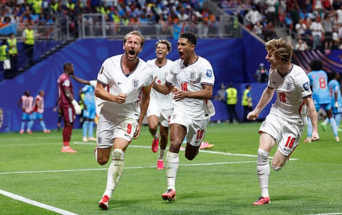 Harry Kane (L) rejoices after scoring the opening goal against DR Congo on Wednesday