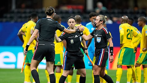 Referee Tori Penso and assistant referees Brooke Mayo and Kathryn Nesbitt, made up an all-woman referee team at the FIFA World Cup 2026