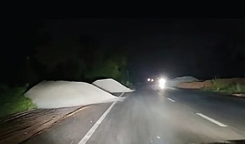 File photo of fly ash dumped on a road