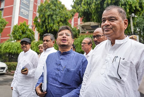 West Bengal Leader of the Opposition Ritabrata Banerjee, centre, speaks to the media outside Nirvachan Sadan