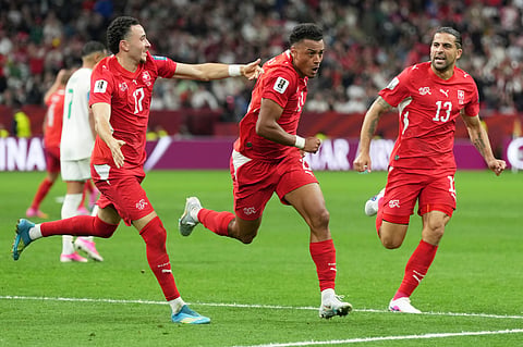 Switzerland's Dan Ndoye (11), center, celebrates with teammates after scoring his side's second goal during the World Cup round of 32 soccer match between Switzerland and Algeria in Vancouver, British Columbia, Thursday, July 2, 2026.