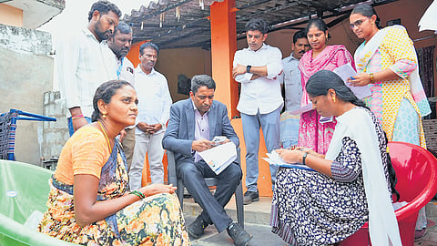 During a visit to Ramachandrapuram village in A Konduru mandal, the Collector inspected the door-to-door verification process being carried out by Booth Level Officers (BLOs).