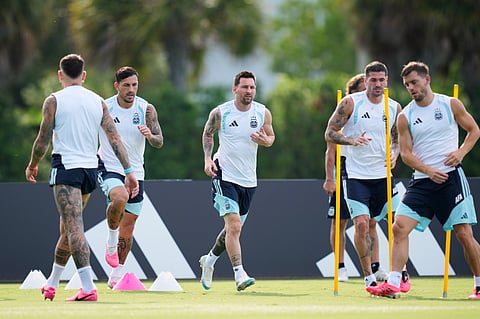 Argentina's Lionel Messi, center, and teammates work out during a training session on the eve of their World Cup round of 32 soccer match against Cape Verde, in Fort Lauderdale, Fla., Thursday, July 2, 2026.